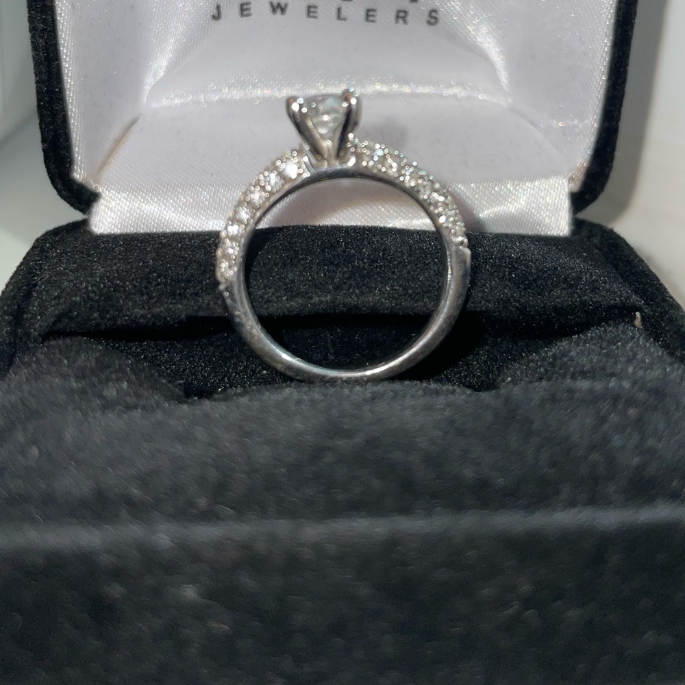 Diamond Engagement Ring. 14 Ct White gold band with diamonds in a Pavé setting